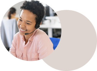 a woman wearing a headset is following up by phone